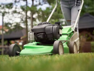 female-legs-woman-using-lawn-mower